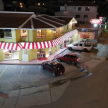 Papi Broster outside